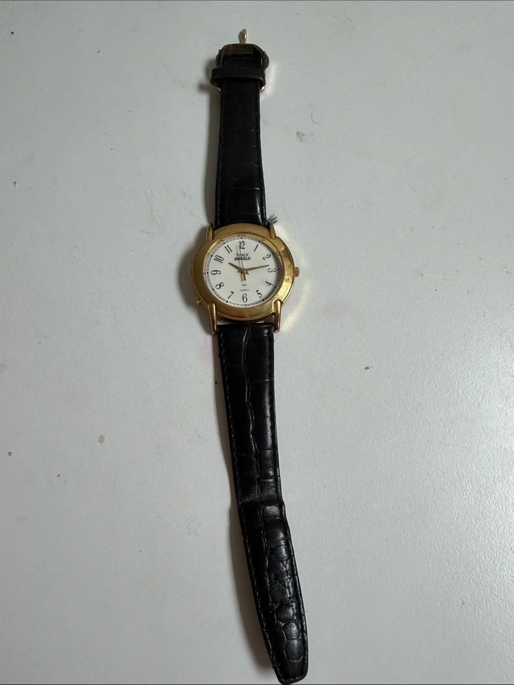 Vintage Timex Men's indiglo Watch Black Strap Gold Case White Dial needs battery